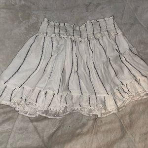 white striped skirt. tight on top. flowy on bottom
